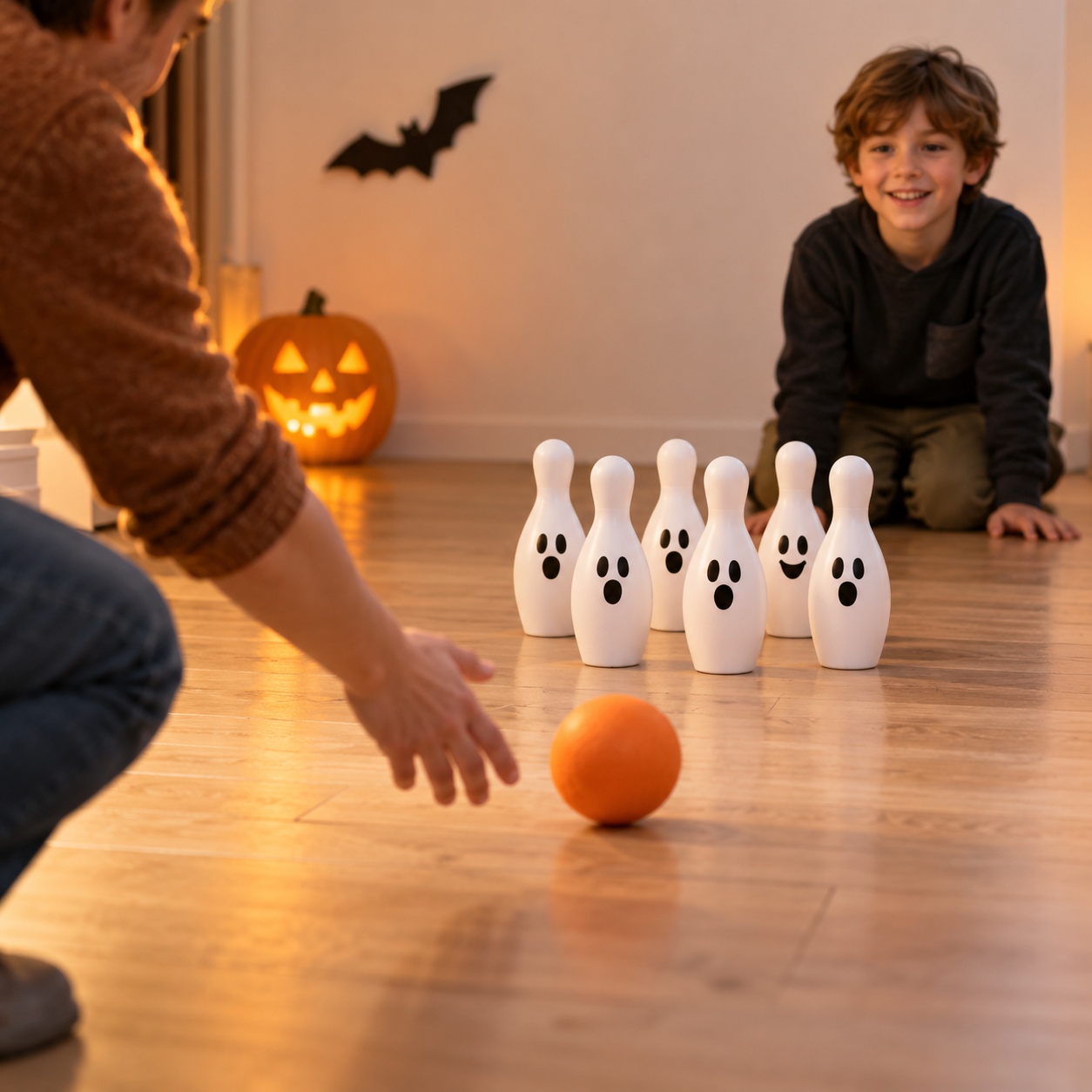 Halloween pumpkin bowling with plastic bottles